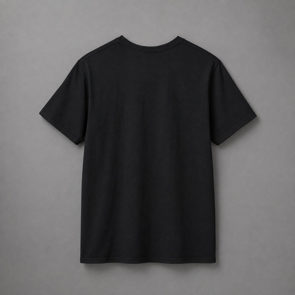Black short-sleeve crewneck T-shirt featuring a gray “BEAU” graphic with a white cursive “D’Accord” overlay in front, pure black in back, displayed against a neutral gray studio background.
