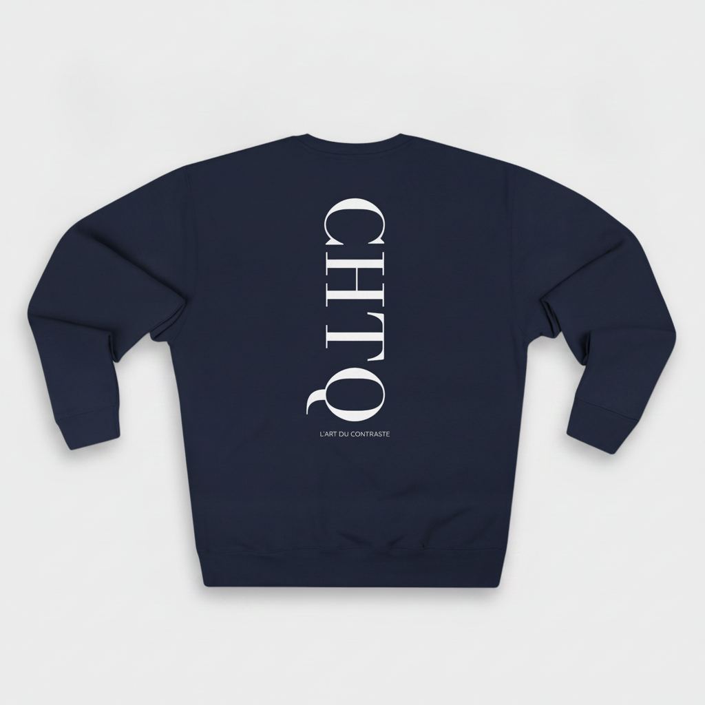 Navy blue crewneck sweatshirt with a large white vertical CHTQ graphic and L’Art du Contraste text on the back, displayed against a white background.