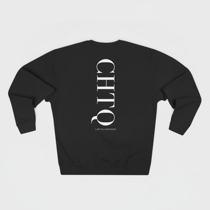 Black crewneck sweatshirt with a large white vertical CHTQ graphic and L’Art du Contraste text on the back, displayed against a white background.