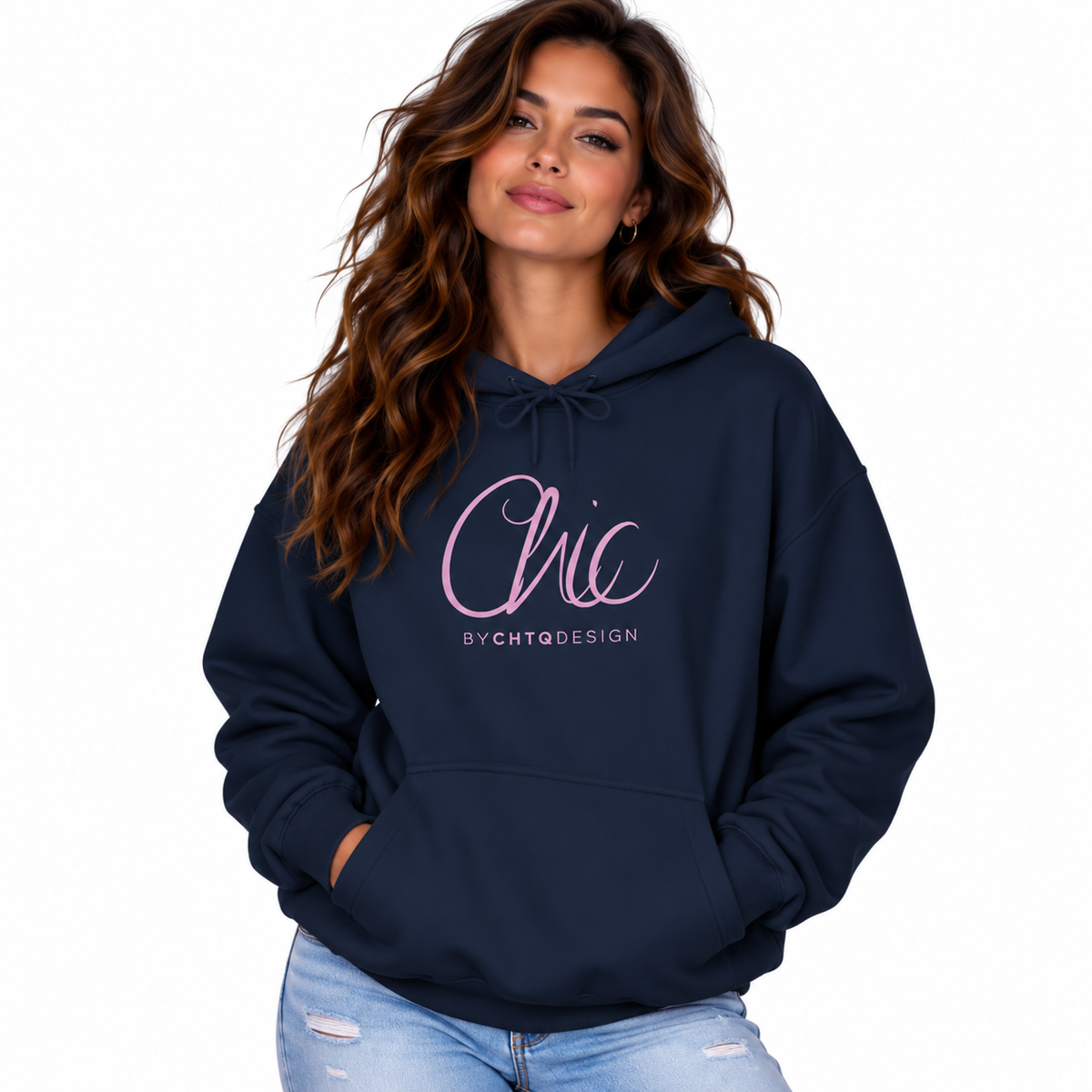 A woman wearing a navy blue pullover hoodie with a pink 'Chic BY CHTQ DESIGN' graphic on the chest, paired with light blue jeans, set against a plain white background.