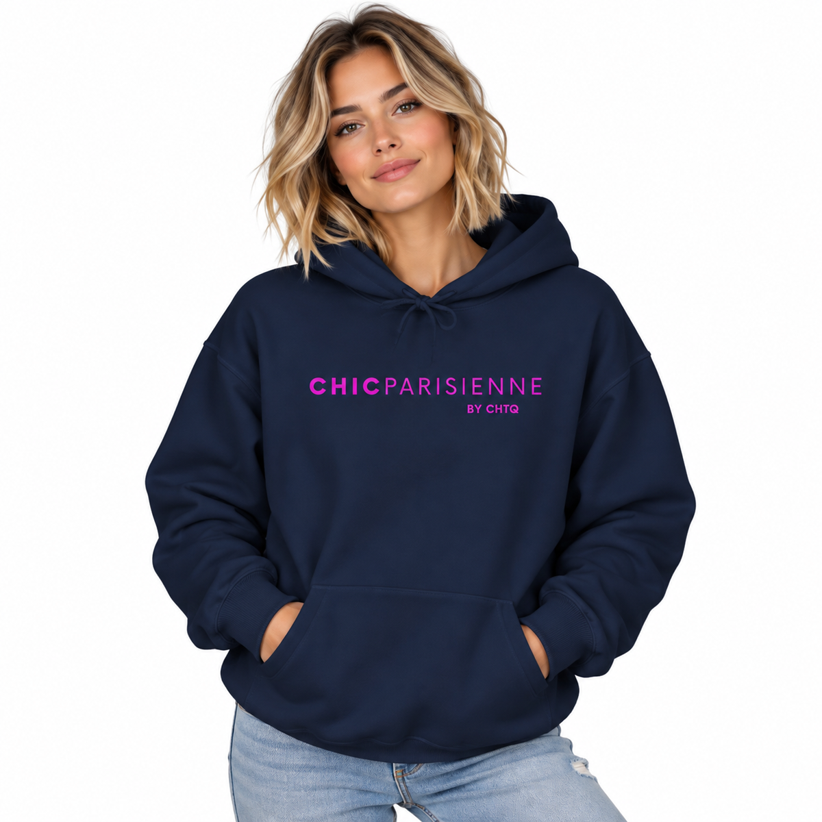 A woman wearing a navy blue hoodie with 'CHICPARISIENNE by CHIC' printed in pink across the chest, paired with light blue jeans, set against a plain white background.