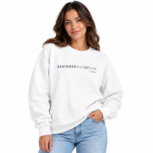 A woman wearing a white crewneck sweatshirt with 'DESIGNED OUT OF LINE by CHTQ' printed in black across the chest, paired with light blue jeans, against a plain white background.