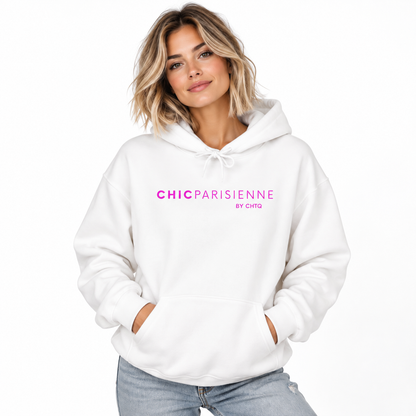 A woman wearing a white pullover hoodie with 'CHICPARISIENNE by CHIC' printed in pink across the chest, paired with light blue jeans, against a plain white background.